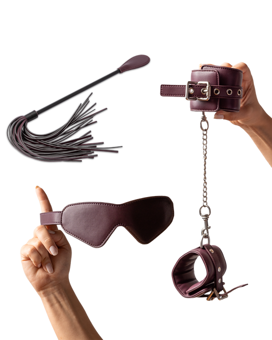 Beginner bondage kit with blindfold, cuffs, crop and tassel