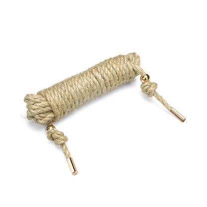 Natural Jute Shibari Rope coiled neatly – hemp bondage rope for traditional Japanese rope play.
