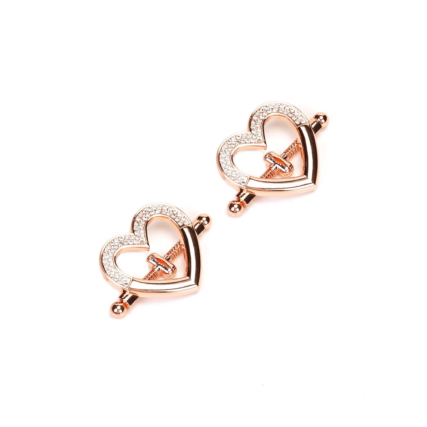 close up of rhinestone heart detail on Rose Gold nipple clamps