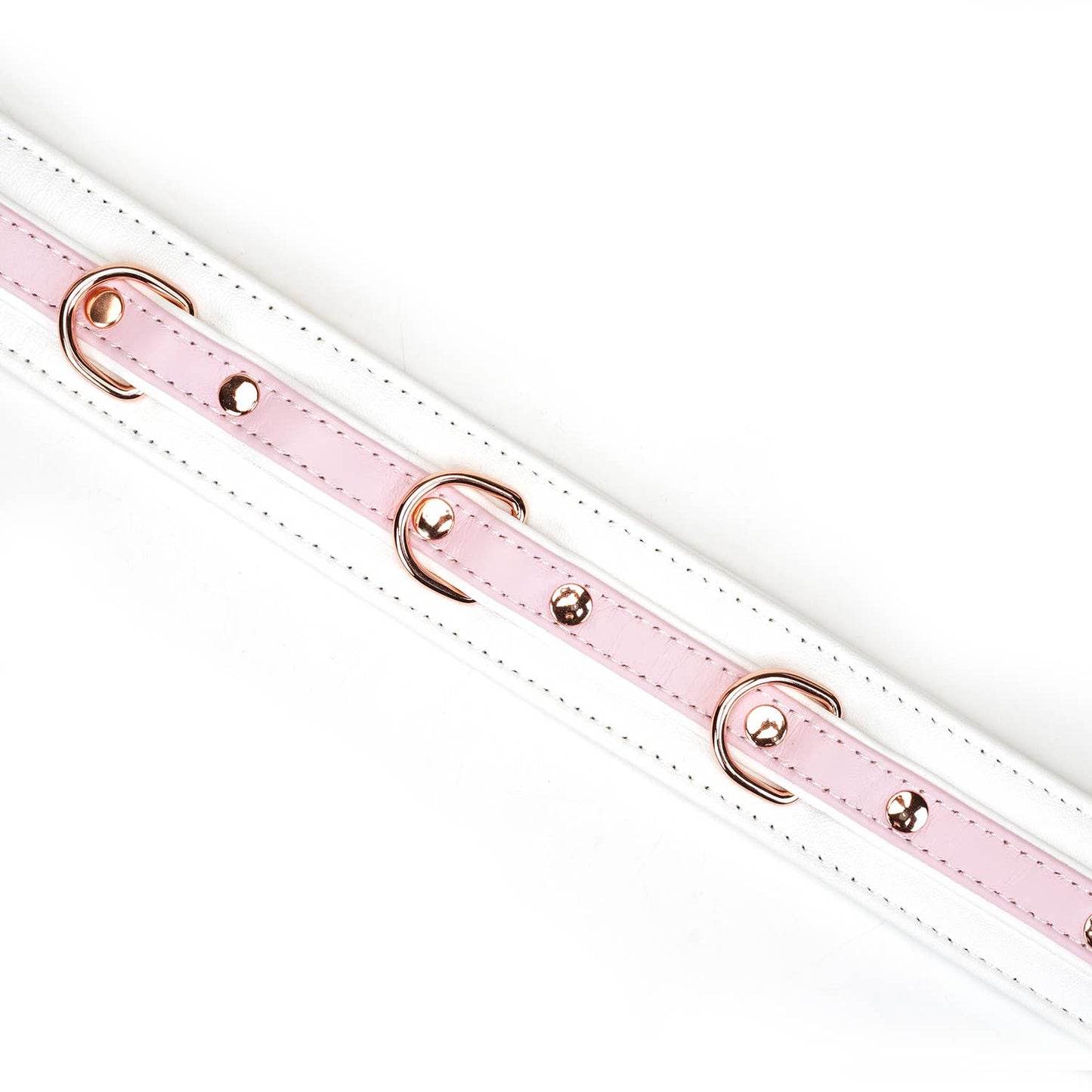 Close-up of padded pastel bondage collar in premium lamb leather