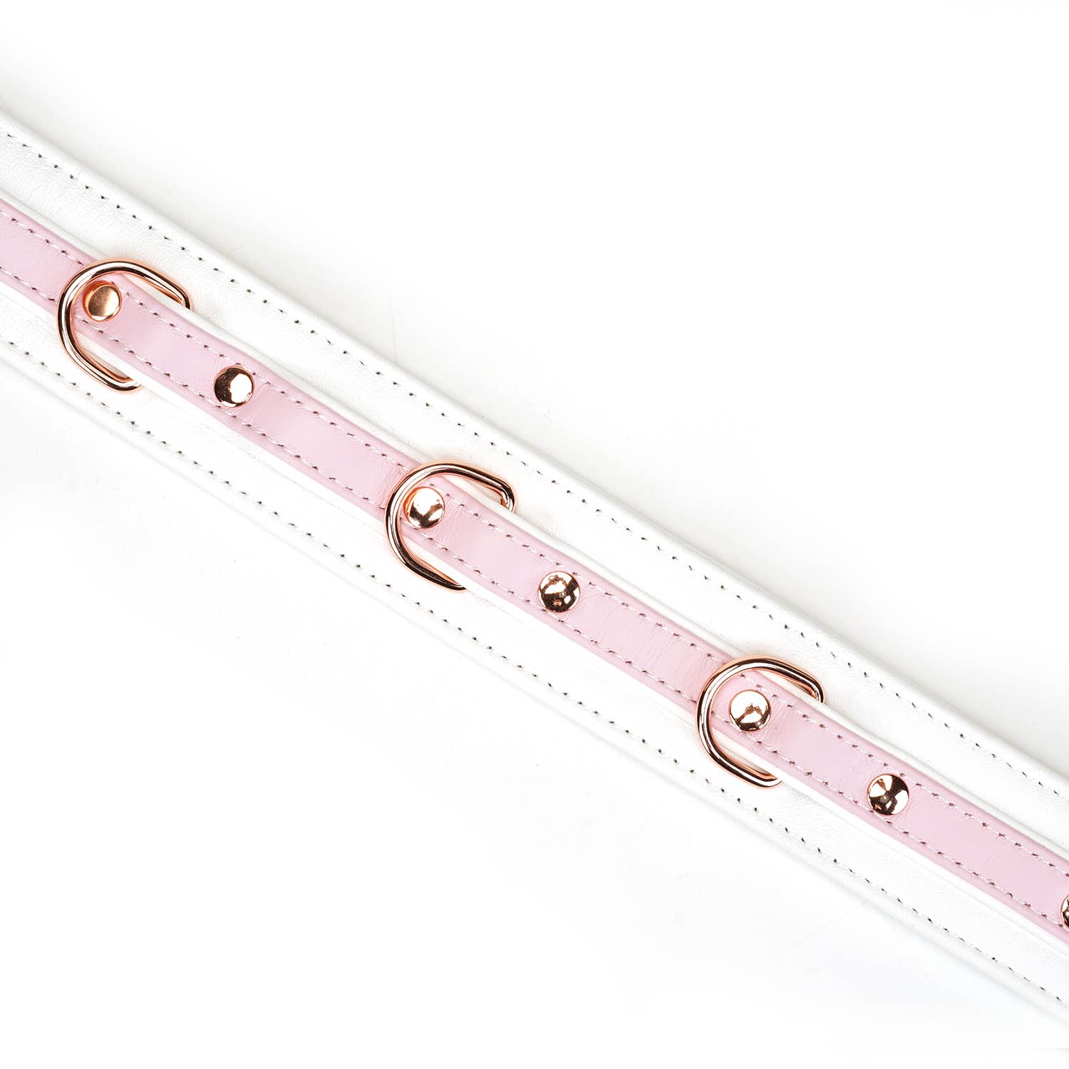 Close-up of padded pastel bondage collar in premium lamb leather