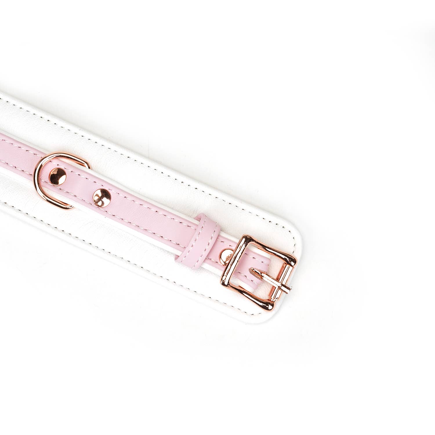 Adjustable white and pink leather bondage cuffs with rose gold details