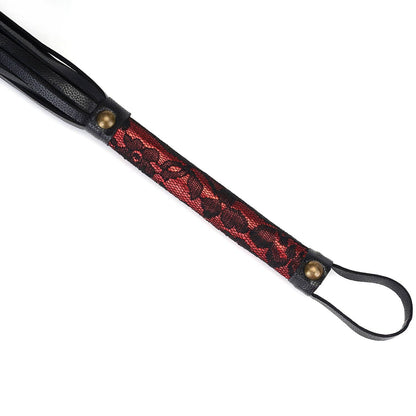 ruby-red vegan leather handle with delicate black lace and black leather loop