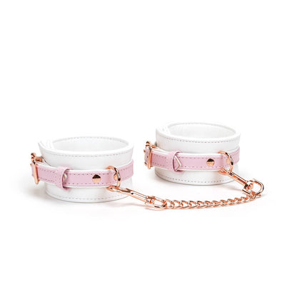 White and pink leather handcuffs with rose gold chain and hardware