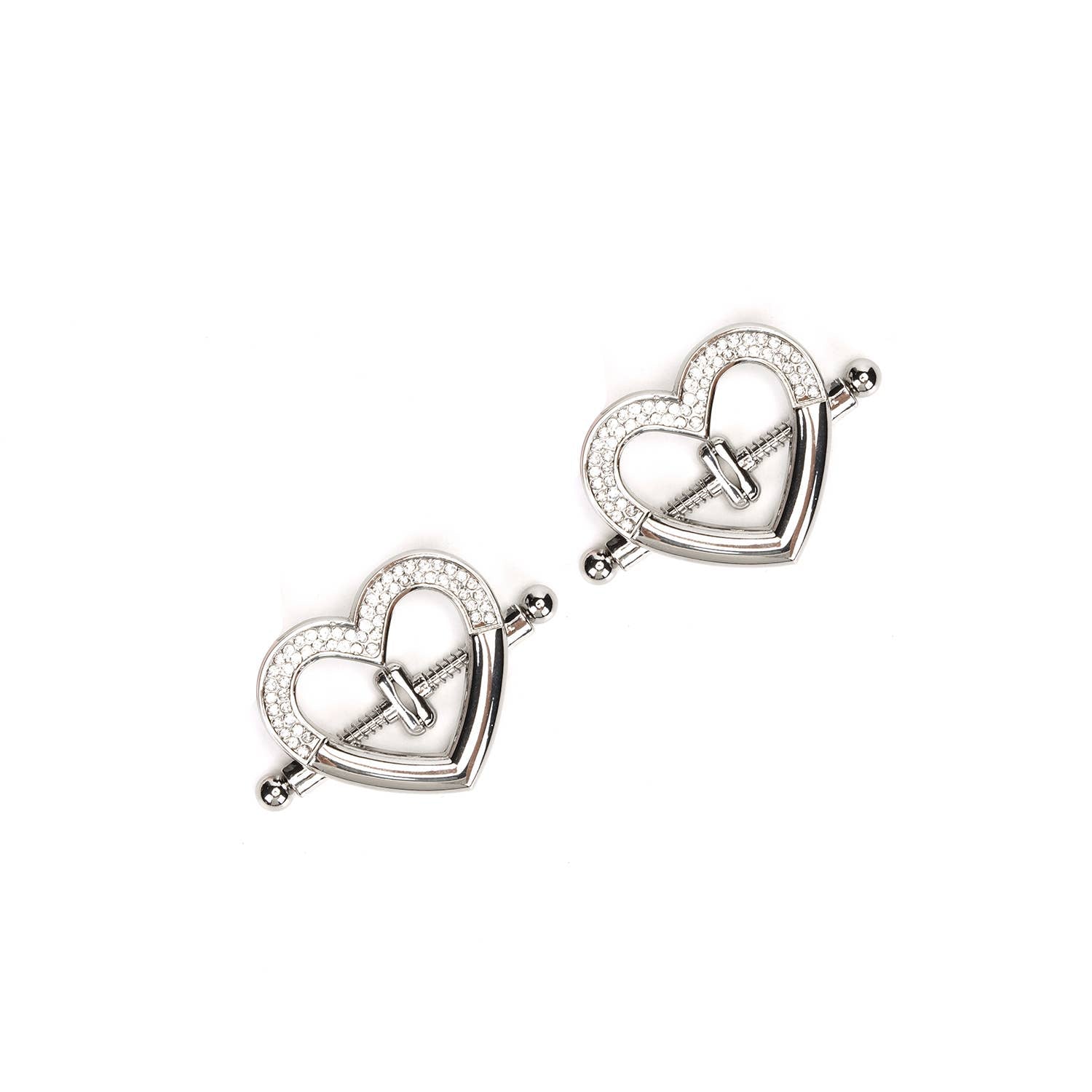Silver heart-shaped nipple clamps with rhinestone detail on white background.