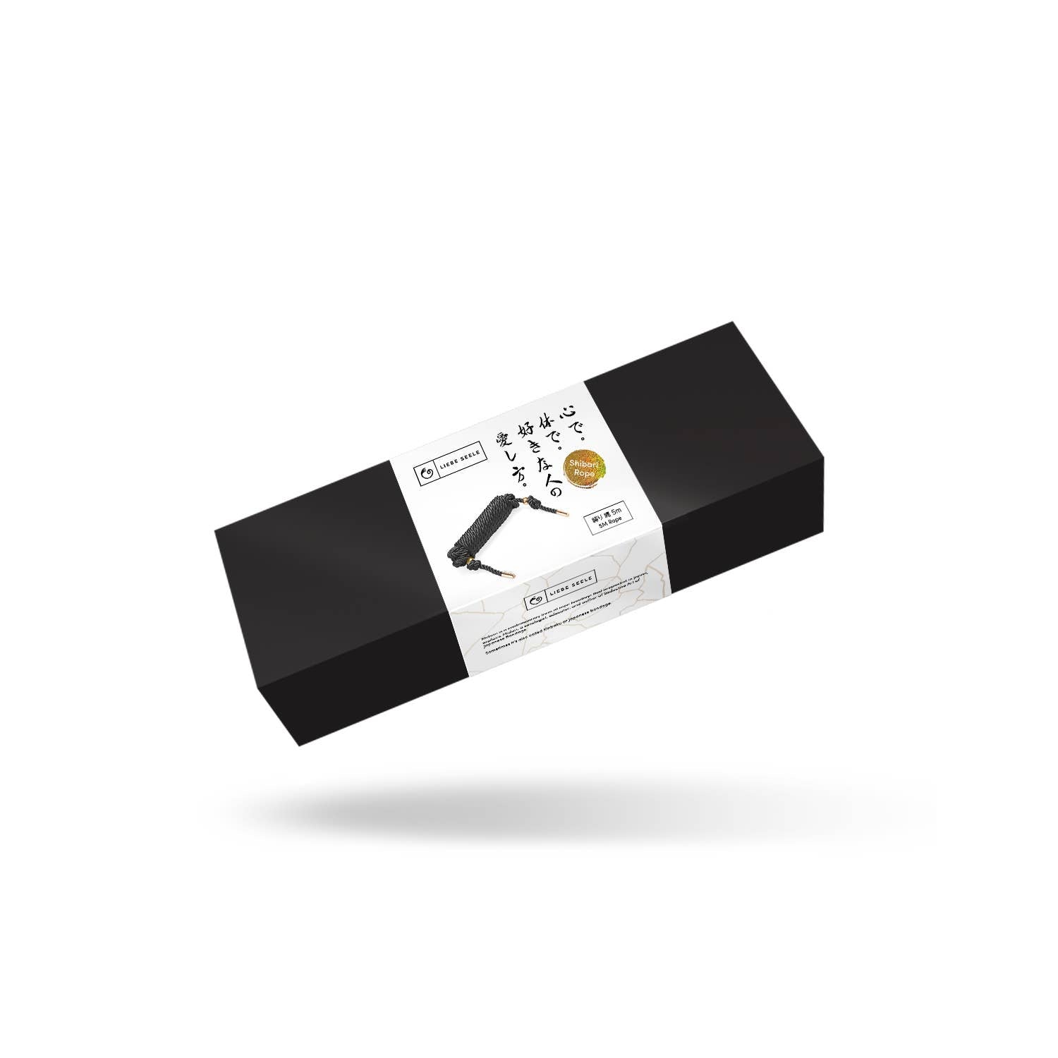 Black Shibari Rope tied in decorative knot – perfect for Shibari and body art play.