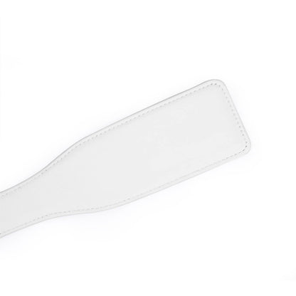 luxury white pink impact play paddle close up